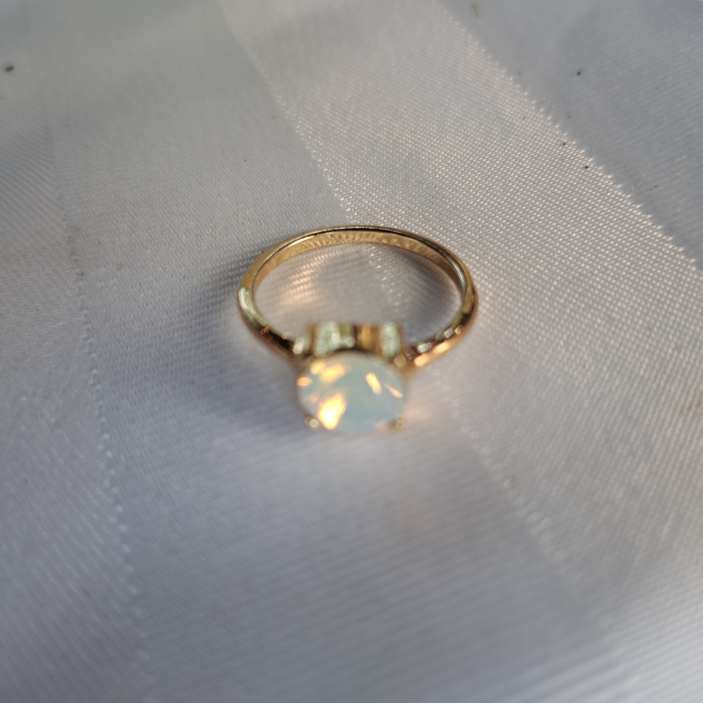 Elegant Gold Tone Ring with Opalescent Stone